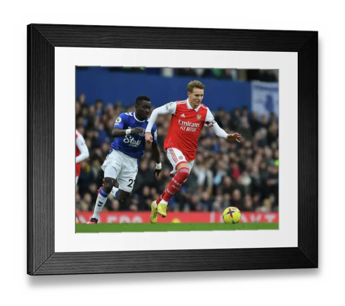Framed Print : Odegaard Outsmarts Gueye: Intense On-Pitch Battle from Arsenal's Triumph over Everton Framed Print : Odegaard Outsmarts Gueye: Intense On-Pitch Battle from Arsenal's Triumph over Everton