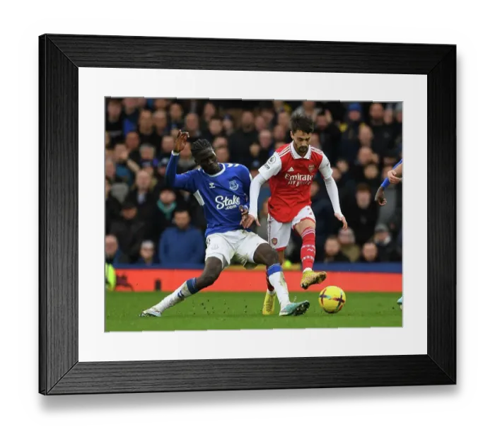 Framed Print : Fabio Vieira vs Amadou Onana: Battle at Goodison Park - Everton vs Arsenal, Premier League 2022-23