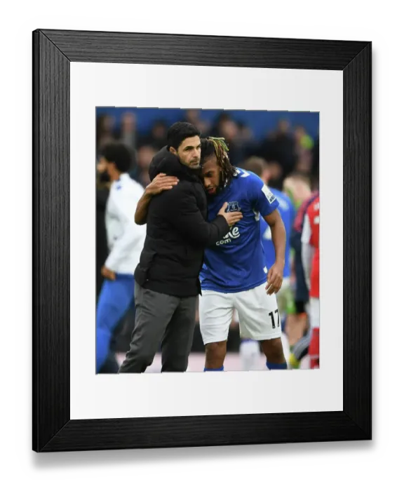 Framed Print : Mikel Arteta Embraces Alex Iwobi: Everton vs. Arsenal, Premier League 2022-23