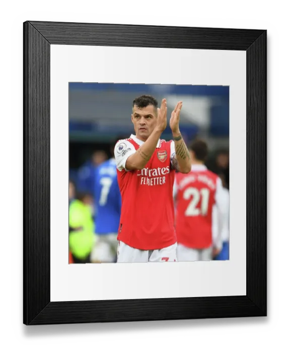 Framed Print : Granit Xhaka's Emotional Applause: Everton vs. Arsenal, Premier League 2022-23 - A Heartfelt Moment at Goodison Park