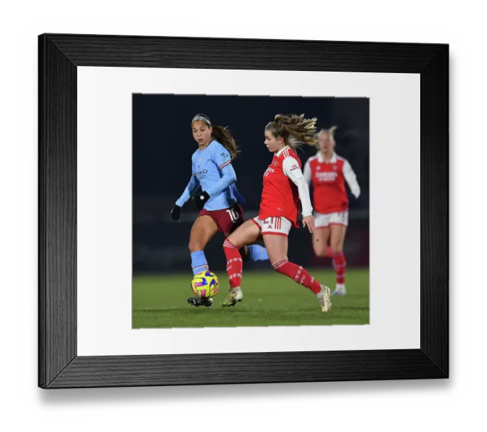 Framed Print : Intense Rivalry: Pelova vs. Castellanos - Arsenal vs. Manchester City FA Women's League Cup Semi-Final: A Battle of Skills and Determination