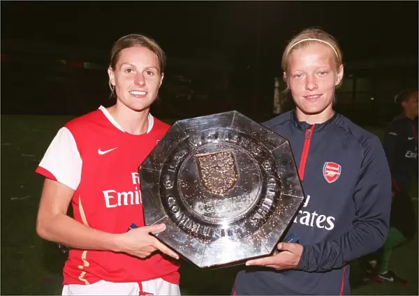Kelly Smitha and Katie Chapman (Arsenal Ladies) with the Community Shield
