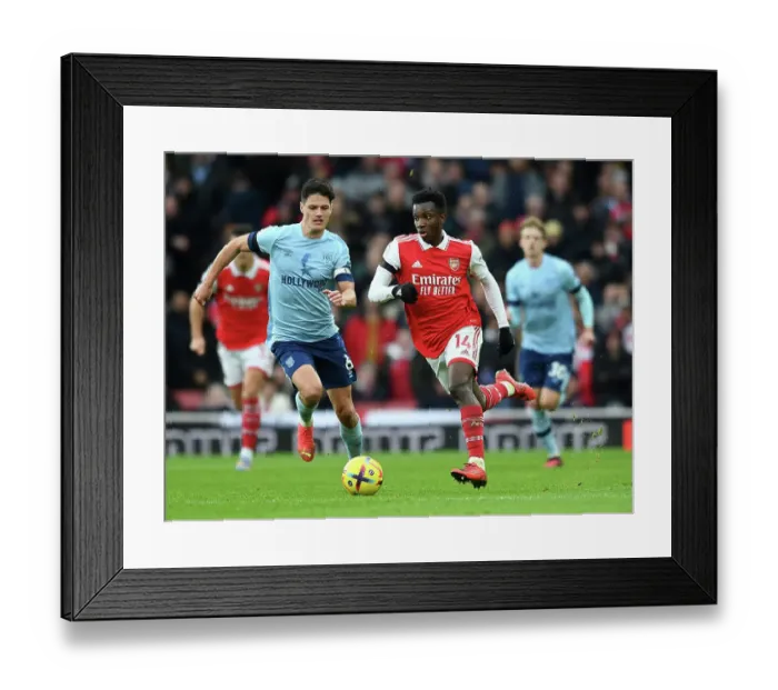 Framed Print : Nketiah vs Norgaard: A Battle of Strengths in Arsenal's Premier League Clash against Brentford