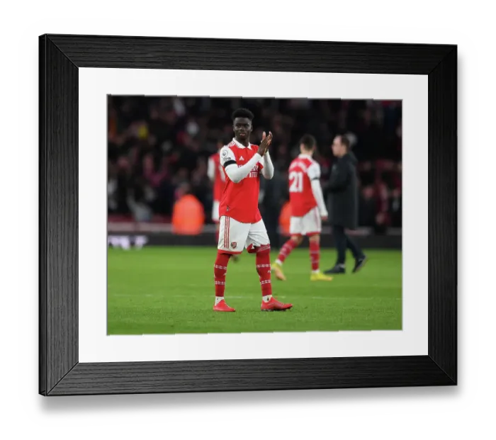 Framed Print : Arsenal's Bukayo Saka Applauding Fans After Arsenal v Brentford Premier League Match, 2023 Framed Print : Arsenal's Bukayo Saka Applauding Fans After Arsenal v Brentford Premier League Match, 2023