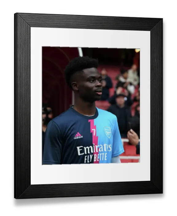 Framed Print : Arsenal's Bukayo Saka Readies for Kickoff Against Brentford in Premier League Showdown Framed Print : Arsenal's Bukayo Saka Readies for Kickoff Against Brentford in Premier League Showdown