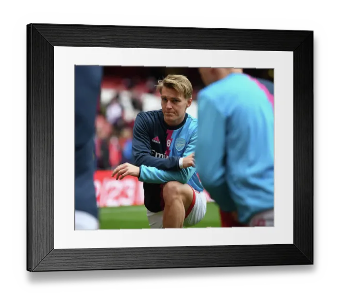 Framed Print : Arsenal's Martin Odegaard: Gearing Up for Premier League Showdown Against Brentford Framed Print : Arsenal's Martin Odegaard: Gearing Up for Premier League Showdown Against Brentford