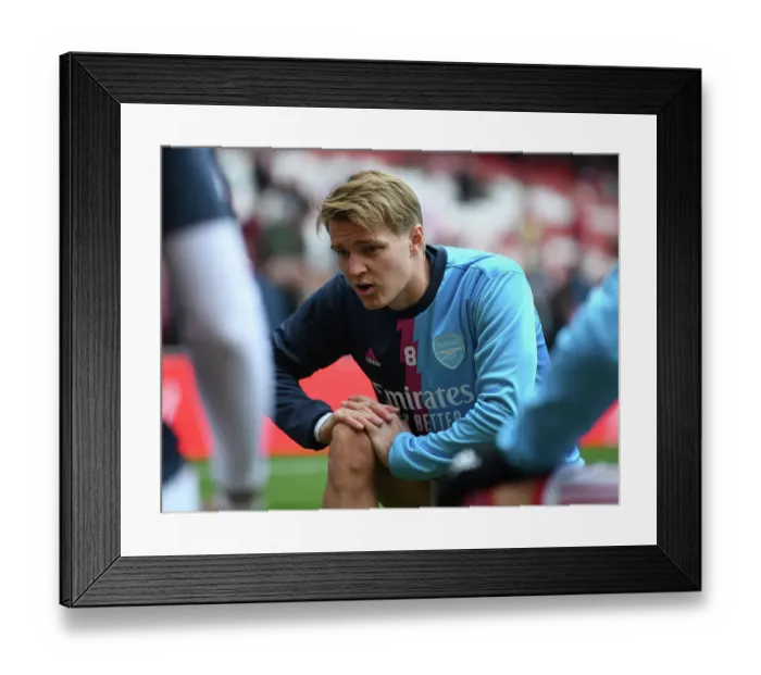 Framed Print : Martin Odegaard Gears Up: Arsenal's Star Prepares for Premier League Showdown Against Brentford Framed Print : Martin Odegaard Gears Up: Arsenal's Star Prepares for Premier League Showdown Against Brentford
