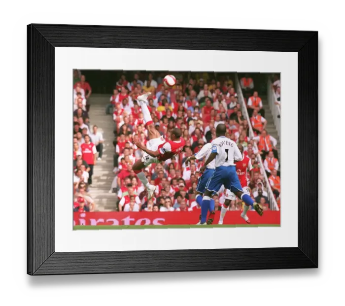 Framed Print : Thierry Henry in Action: The Intense Rivalry - Arsenal vs. Middlesbrough, 2006 Framed Print : Thierry Henry in Action: The Intense Rivalry - Arsenal vs. Middlesbrough, 2006