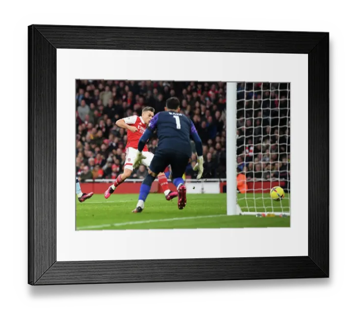 Framed Print : Arsenal's Trossard Scores in Premier League Victory over Brentford