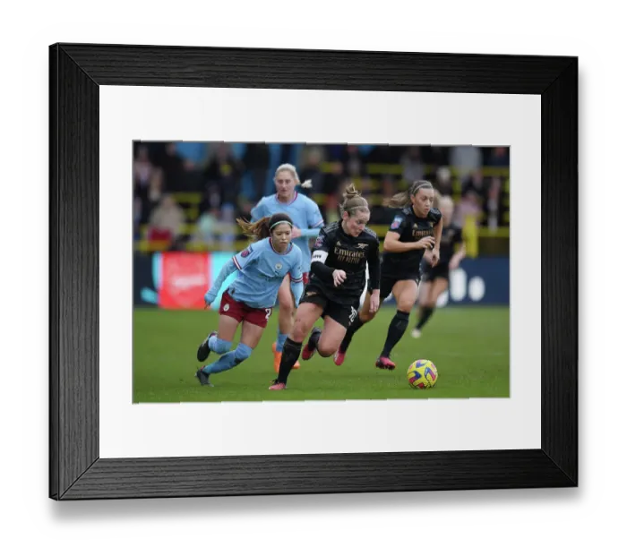 Framed Print : Arsenal's Kim Little Faces Off Against Manchester City's Yui Hasegawa in FA Women's Super League Clash