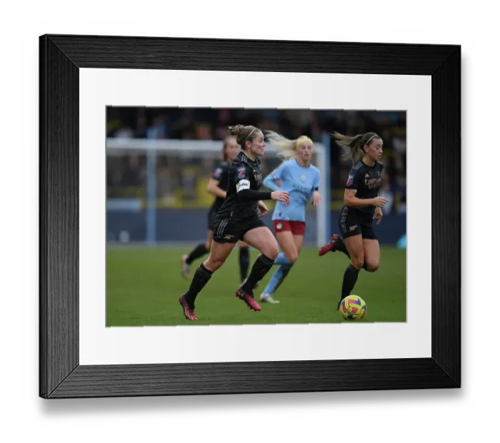 Framed Print : Arsenal's Kim Little Fights for Victory in Intense Barclays Women's Super League Clash Against Manchester City