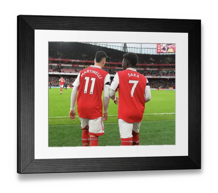 Framed Print : Arsenal's Martinelli and Saka in Action: Arsenal FC vs Brentford FC, Premier League 2022-23
