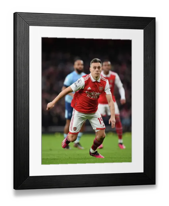 Framed Print : Arsenal's Trossard in Action against Brentford in the Premier League