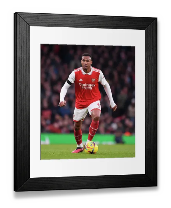 Framed Print : Arsenal's Gabriel Faces Off Against Brentford in Premier League Clash at Emirates Stadium
