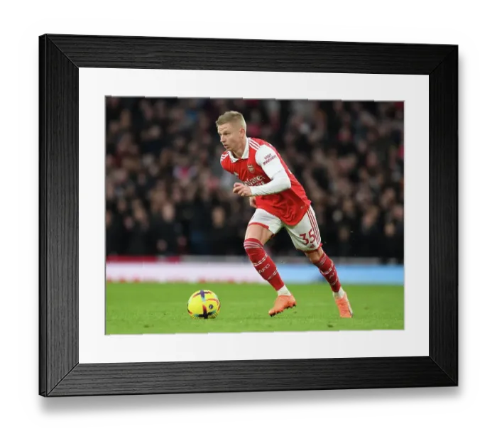 Framed Print : Arsenal's Zinchenko in Action against Brentford in the Premier League