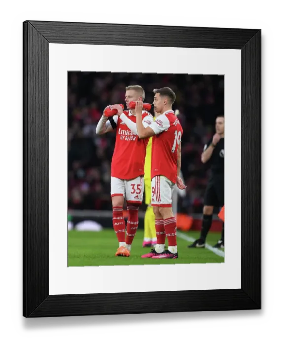 Framed Print : Arsenal's Zinchenko and Trossard Clash in Arsenal vs. Brentford Premier League Showdown Framed Print : Arsenal's Zinchenko and Trossard Clash in Arsenal vs. Brentford Premier League Showdown