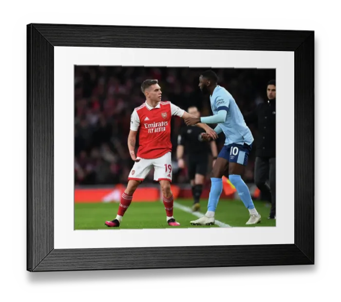 Framed Print : Arsenal vs. Brentford: Trossard vs. Dasilva Clash in Premier League Showdown Framed Print : Arsenal vs. Brentford: Trossard vs. Dasilva Clash in Premier League Showdown