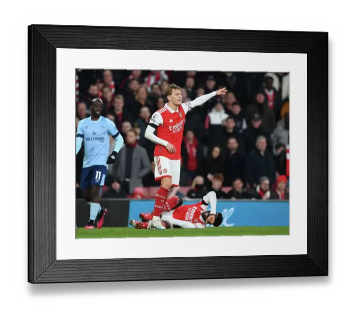 Framed Print : Martin Odegaard's Brilliant Performance: Arsenal's Victory Over Brentford at Emirates Stadium Framed Print : Martin Odegaard's Brilliant Performance: Arsenal's Victory Over Brentford at Emirates Stadium