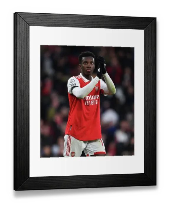 Framed Print : Arsenal's Eddie Nketiah Celebrates with Fans After Win Against Brentford Framed Print : Arsenal's Eddie Nketiah Celebrates with Fans After Win Against Brentford