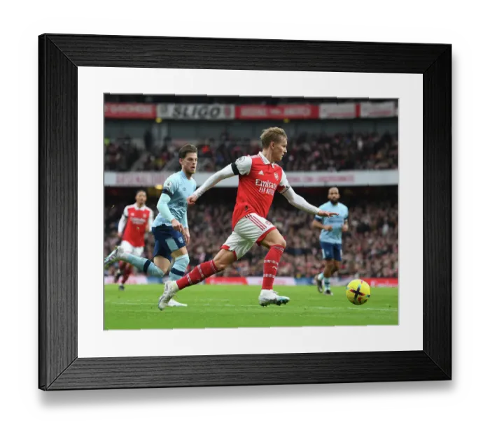 Framed Print : Arsenal's Martin Odegaard Shines in Arsenal FC vs. Brentford FC Premier League Clash at Emirates Stadium
