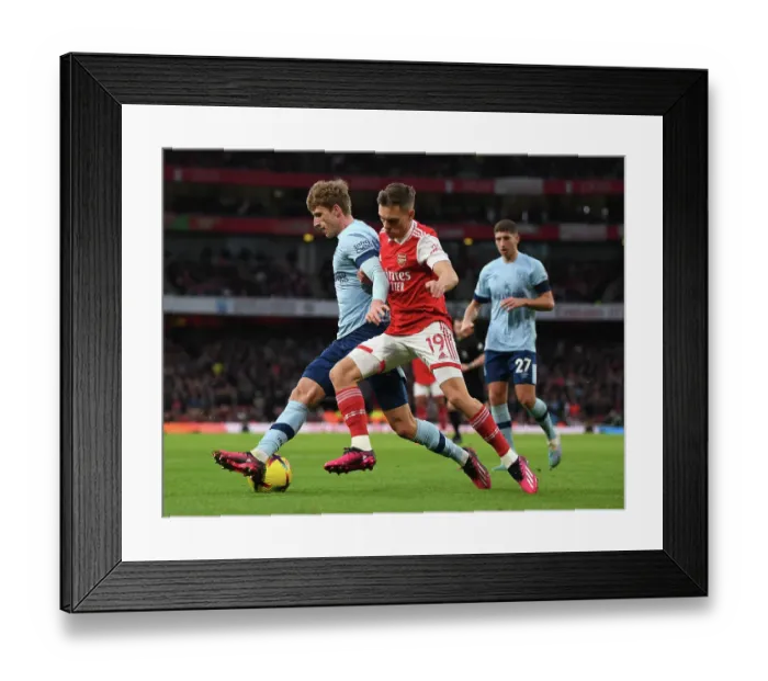 Framed Print : Arsenal's Trossard Shines: Premier League Triumph Over Brentford