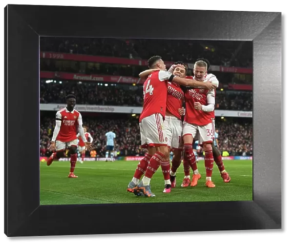 Arsenal's Xhaka, Zinchenko and Trossard: Celebrating a Goal Against Brentford (2022-23)