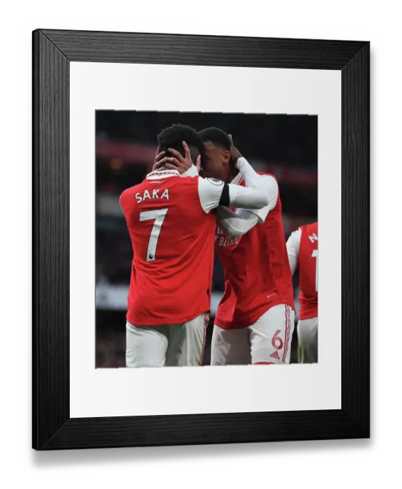 Framed Print : Arsenal's Saka and Gabriel in Action: A Battle at Emirates Stadium, Arsenal vs. Brentford, Premier League 2022-23 Framed Print : Arsenal's Saka and Gabriel in Action: A Battle at Emirates Stadium, Arsenal vs. Brentford, Premier League 2022-23