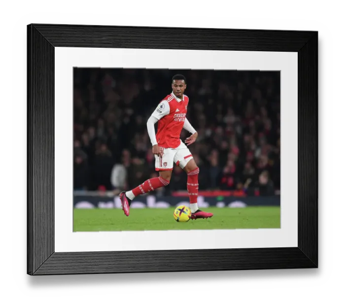 Framed Print : Arsenal's Gabriel Magalhaes Goes Head-to-Head with Manchester City: A Premier League Battle Framed Print : Arsenal's Gabriel Magalhaes Goes Head-to-Head with Manchester City: A Premier League Battle