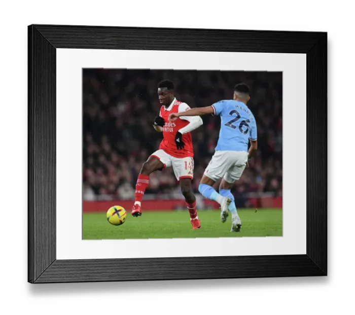 Framed Print : Arsenal's Eddie Nketiah Faces Off Against Manchester City in Intense Premier League Showdown