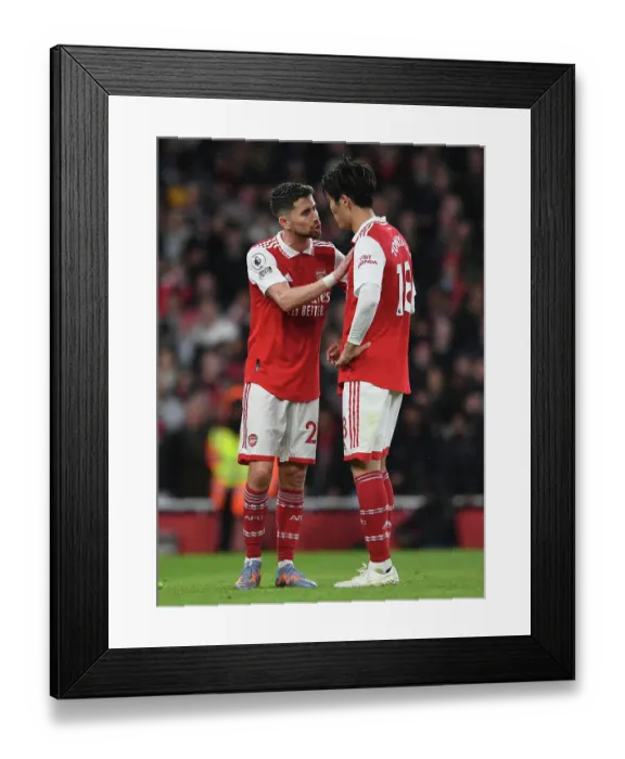 Framed Print : Tomiyasu vs Jorginho: A Premier League Showdown at the Emirates Framed Print : Tomiyasu vs Jorginho: A Premier League Showdown at the Emirates