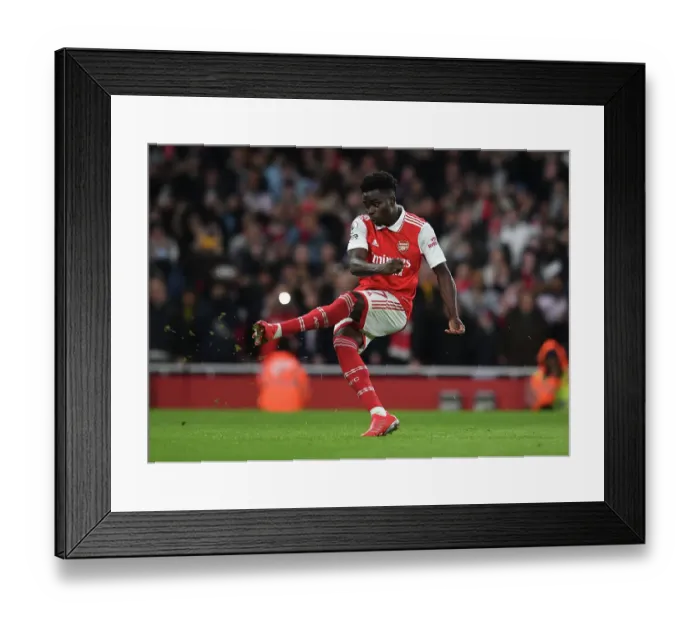 Framed Print : Bukayo Saka Scores Dramatic Penalty: Arsenal Upsets Manchester City in 2022-23 Premier League