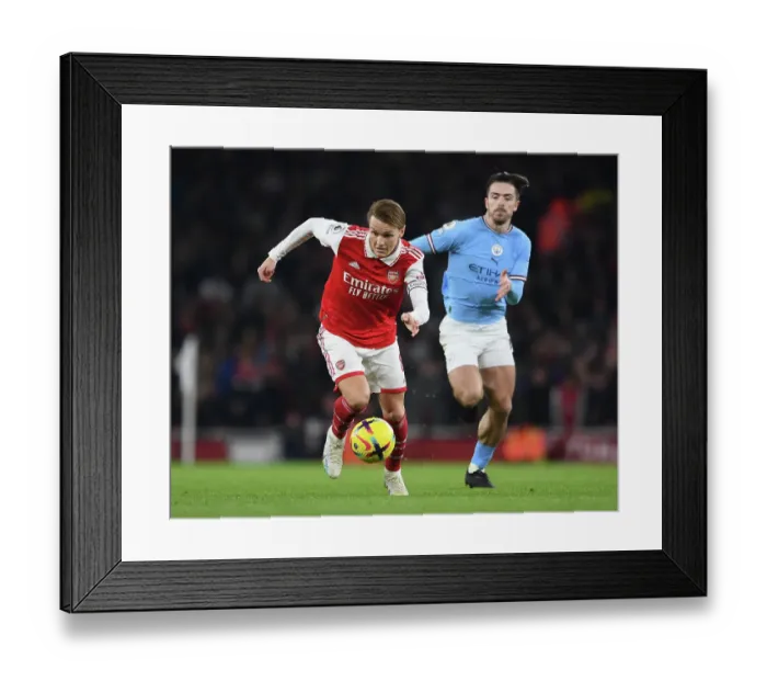 Framed Print : Battle of Midfield Masters: Odegaard vs Grealish in Arsenal vs Manchester City Showdown Framed Print : Battle of Midfield Masters: Odegaard vs Grealish in Arsenal vs Manchester City Showdown