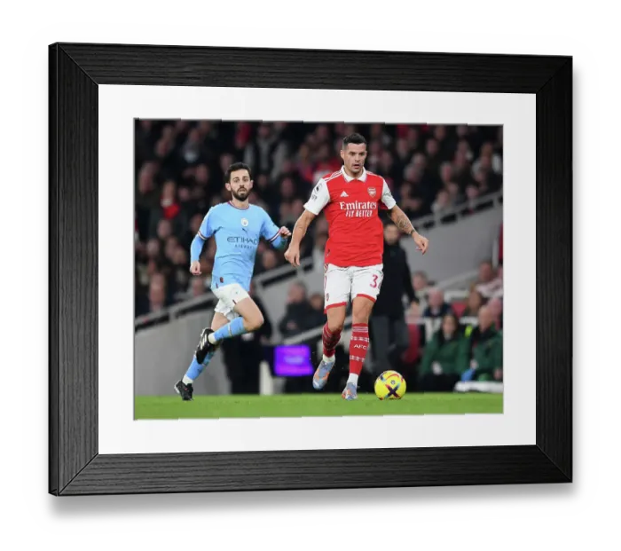 Framed Print : Granit Xhaka: Arsenal's Midfield Maestro in Action Against Manchester City, Premier League 2022-23 Framed Print : Granit Xhaka: Arsenal's Midfield Maestro in Action Against Manchester City, Premier League 2022-23