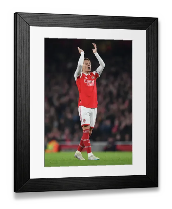 Framed Print : Arsenal's Odegaard Faces Manchester City: Intense Midfield Showdown at Emirates Stadium