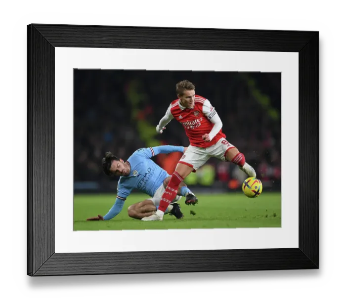 Framed Print : Odegaard Outshines Grealish: Arsenal's Midfielder Wins Key Battle Against Manchester City Rival Framed Print : Odegaard Outshines Grealish: Arsenal's Midfielder Wins Key Battle Against Manchester City Rival