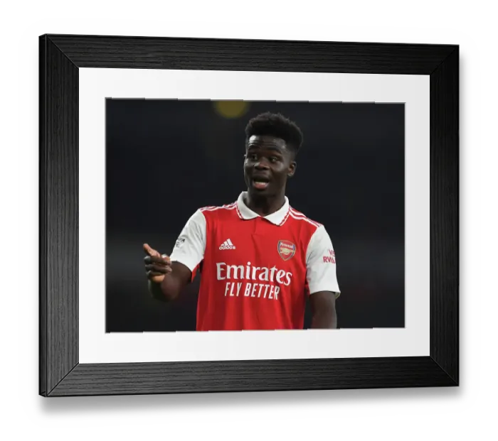 Framed Print : Arsenal's Bukayo Saka Steals the Show in Thrilling Premier League Showdown vs Manchester City (2022-23)