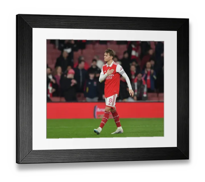 Framed Print : Arsenal's Martin Odegaard Celebrates with Fans after Arsenal vs Manchester City, Premier League 2022-23 Framed Print : Arsenal's Martin Odegaard Celebrates with Fans after Arsenal vs Manchester City, Premier League 2022-23