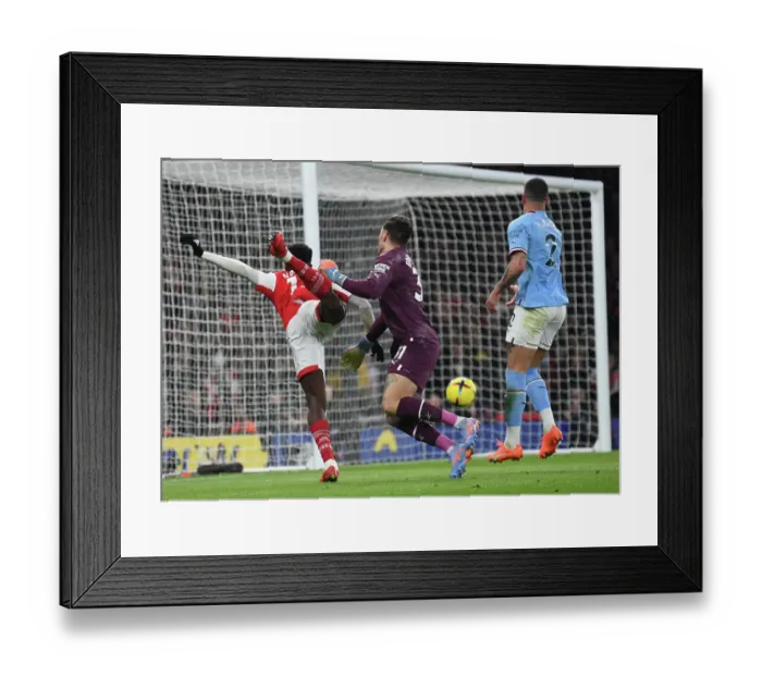 Framed Print : Arsenal vs Manchester City: Nketiah Fouls by Ederson in 2022-23 Premier League Clash Framed Print : Arsenal vs Manchester City: Nketiah Fouls by Ederson in 2022-23 Premier League Clash