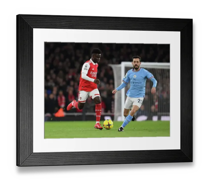Framed Print : Arsenal's Bukayo Saka in Action Against Manchester City - Premier League 2022-23