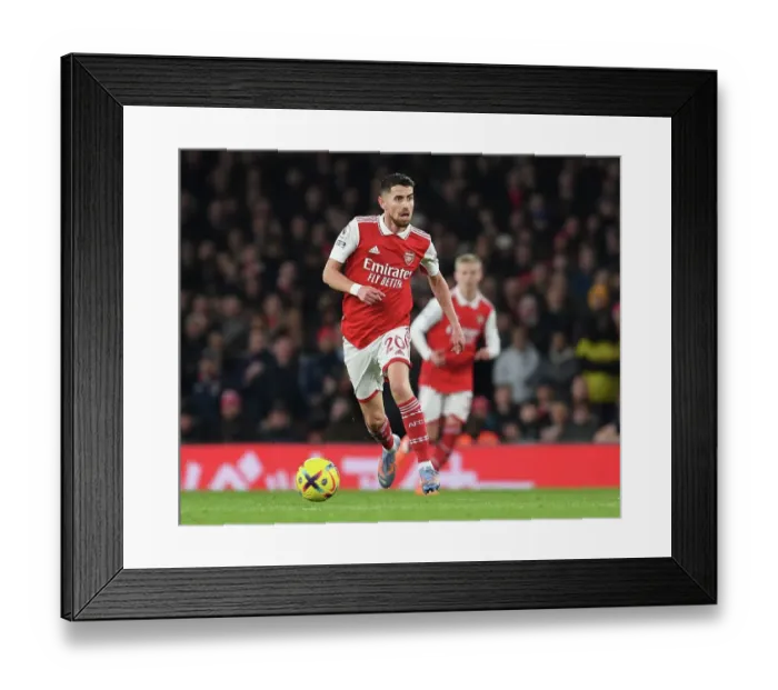 Framed Print : Arsenal vs. Manchester City: Jorginho's Tense Clash in the Premier League Showdown