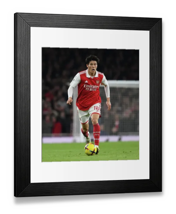 Framed Print : Arsenal's Tomiyasu Faces Manchester City in Intense Premier League Clash