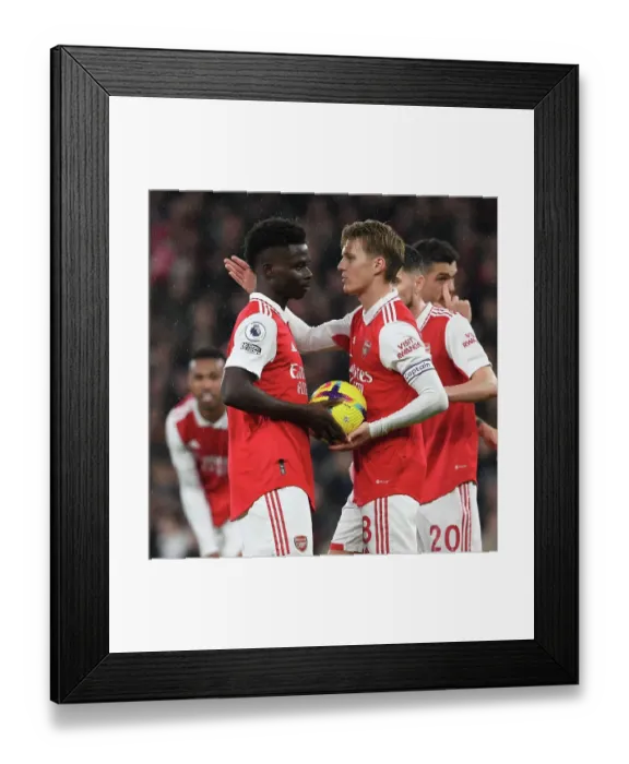 Framed Print : Arsenal's Saka and Odegaard Face Manchester City in Premier League Showdown Framed Print : Arsenal's Saka and Odegaard Face Manchester City in Premier League Showdown