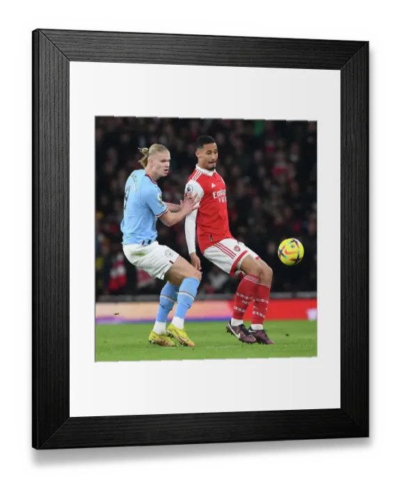 Framed Print : Arsenal vs Manchester City: Saliba vs Haaland Clash in Premier League Showdown