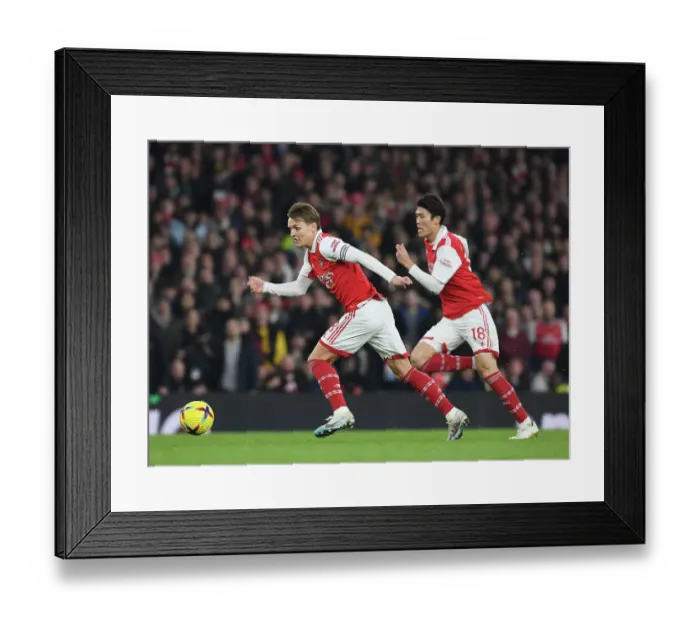 Framed Print : Arsenal's Odegaard and Tomiyasu in Action against Manchester City, Premier League 2022-23