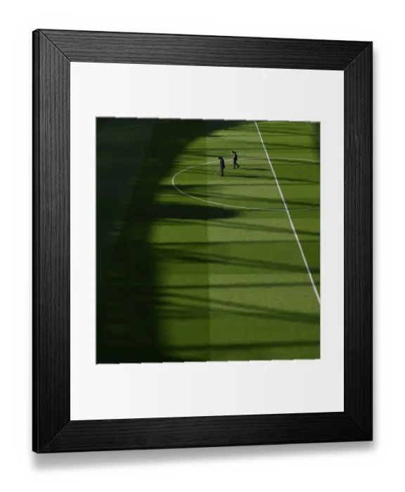 Framed Print : Arsenal vs Manchester City: Pre-Match Pitch Preparation at Emirates Stadium