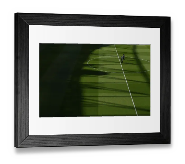 Framed Print : Arsenal vs Manchester City: Pre-Match Groundskeeping at Emirates Stadium