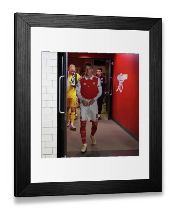 Framed Print : Martin Odegaard's Midfield Battle: Arsenal vs Manchester City, Premier League 2022-23