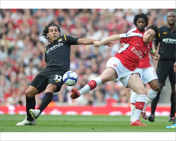 Samir Nasri (Arsenal) Carlos Tevez (Man City). Arsenal 0: 0 Manchester City