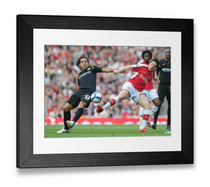 Framed Print : Samir Nasri (Arsenal) Carlos Tevez (Man City). Arsenal 0: 0 Manchester City Framed Print : Samir Nasri (Arsenal) Carlos Tevez (Man City). Arsenal 0: 0 Manchester City