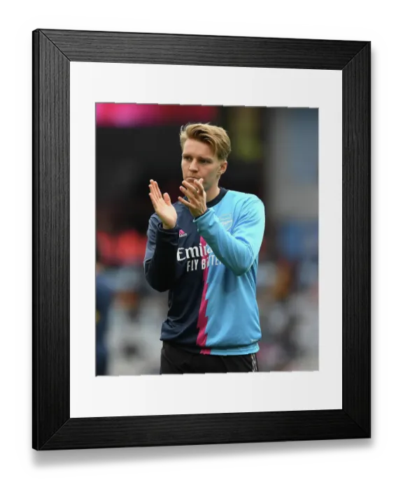 Framed Print : Arsenal's Martin Odegaard Gears Up for Aston Villa Clash in Premier League Framed Print : Arsenal's Martin Odegaard Gears Up for Aston Villa Clash in Premier League